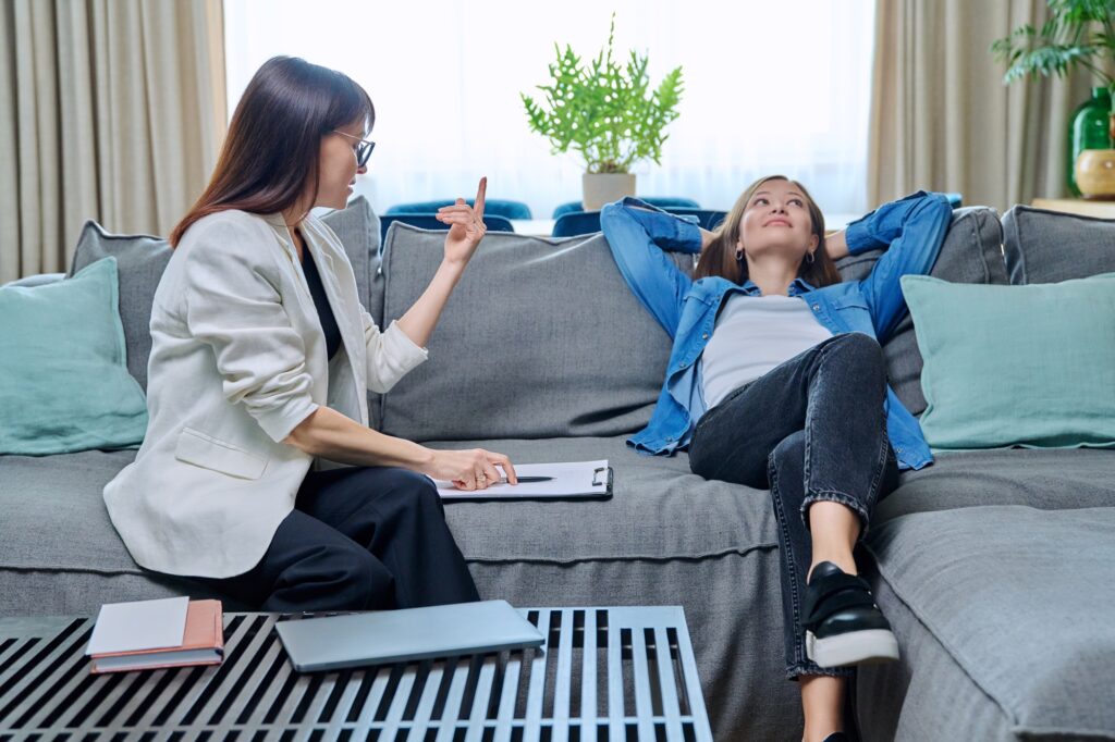 Young woman on therapy session in psychologist's office